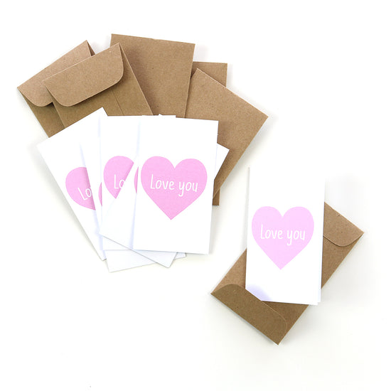 Let someone you care about know just how much you love them with our tiny "love you" heart card. It comes with a tiny kraft envelope. Perfect for all your gifting needs.
