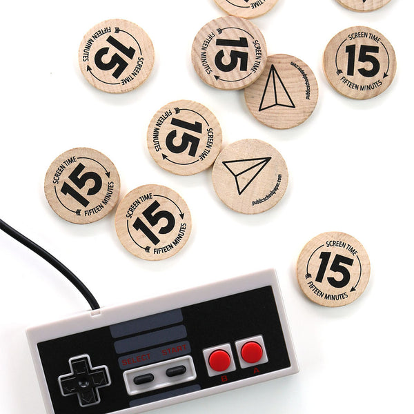 Our wooden "screen time" tokens are a fun tangible way for kids to realize how much time they are spending on screens. There are 12 wooden token in a pack. Each wooden coin is screen printed and built to last.